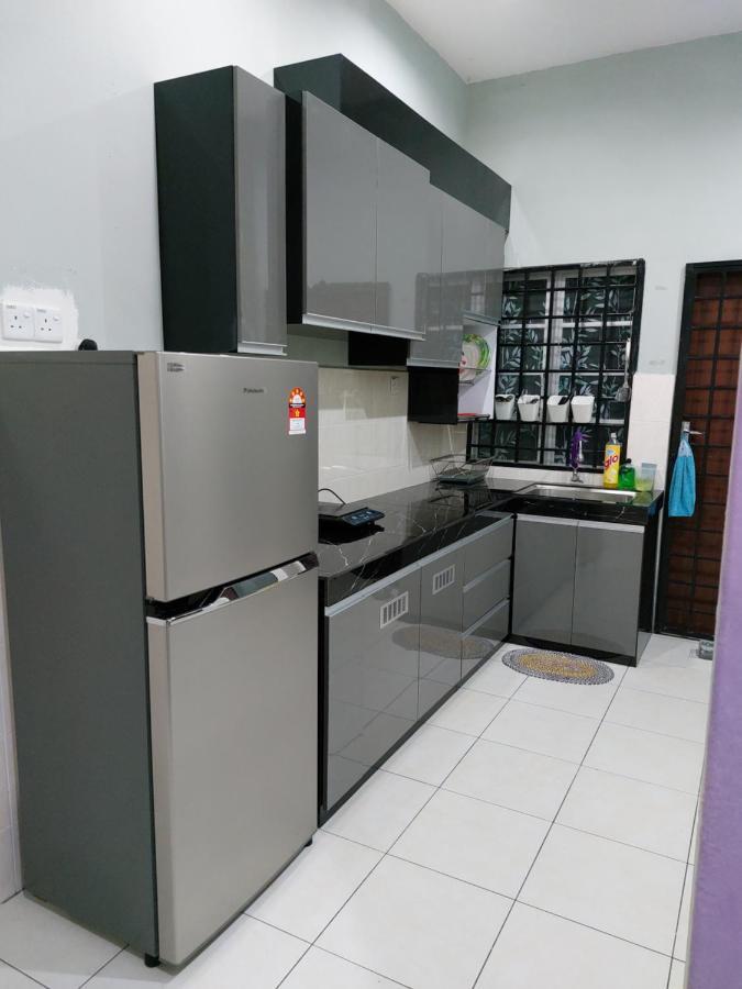 Pelangi Homestay Bota Esterno foto