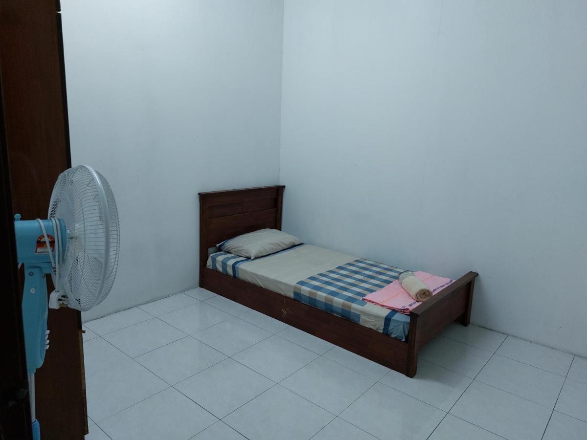 Pelangi Homestay Bota Esterno foto